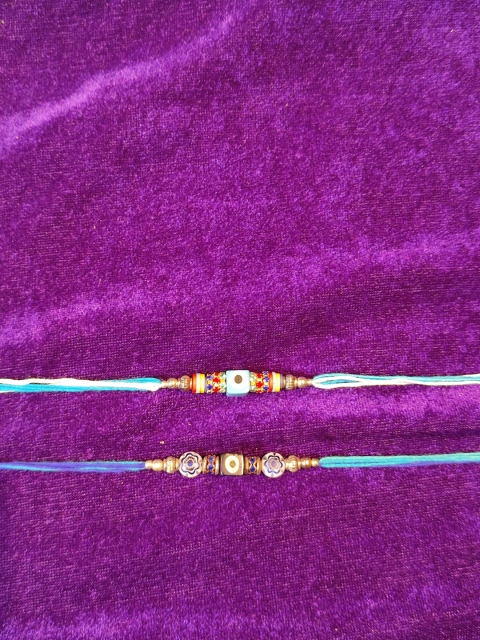 

CRAYTON Men Set Of 2 Blue & Red Beaded Evil Eye Rakhi
