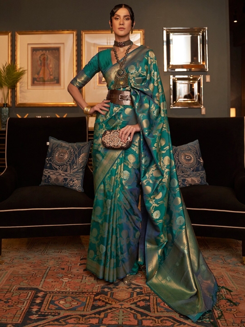 

Mitera Teal & Gold-Toned Ethnic Motifs Zari Silk Blend Banarasi Saree