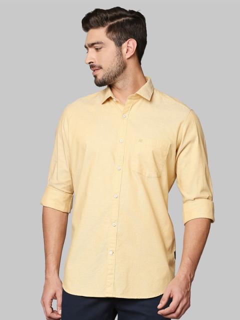 

Raymond Men Yellow Solid Cotton Casual Shirts