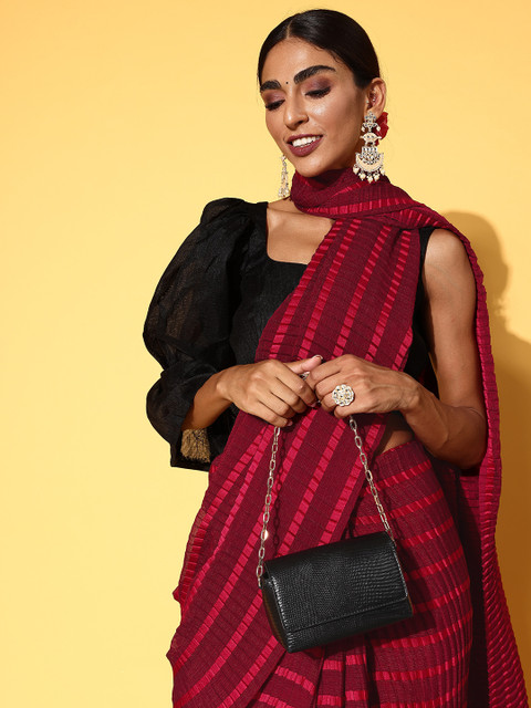 

Tikhi Imli Maroon Striped Accordion Pleated Saree