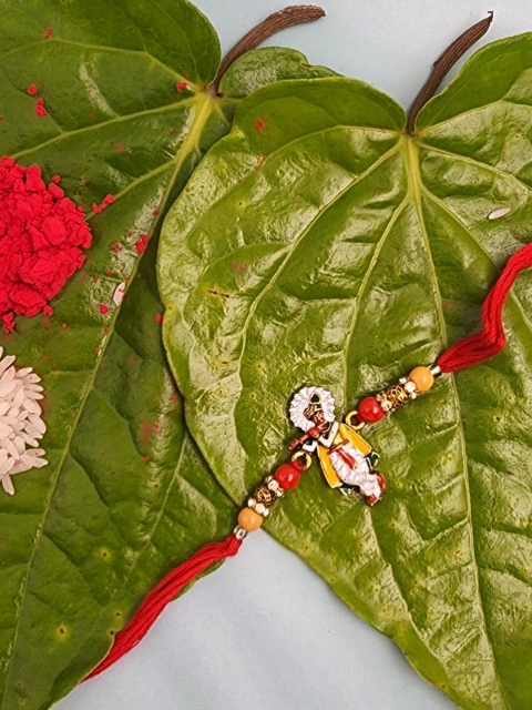 

YOUSTYLO Red & Yellow Lord Krishna Rakhi With Greeting Card & Roli Chawal