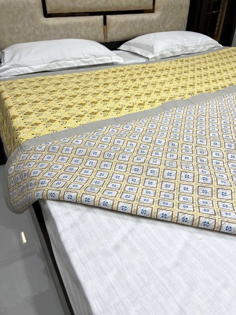 

Pure Decor Yellow & White Ethnic Motifs AC Room 300 GSM Double Bed Dohar