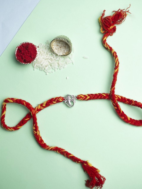 

CURIO COTTAGE Women Red & Silver-Toned Ganesha Pendant Rakhi
