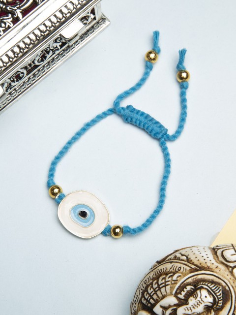 

CURIO COTTAGE Gold-Toned & White Muladhara Root Chakra Embedded Rakhi