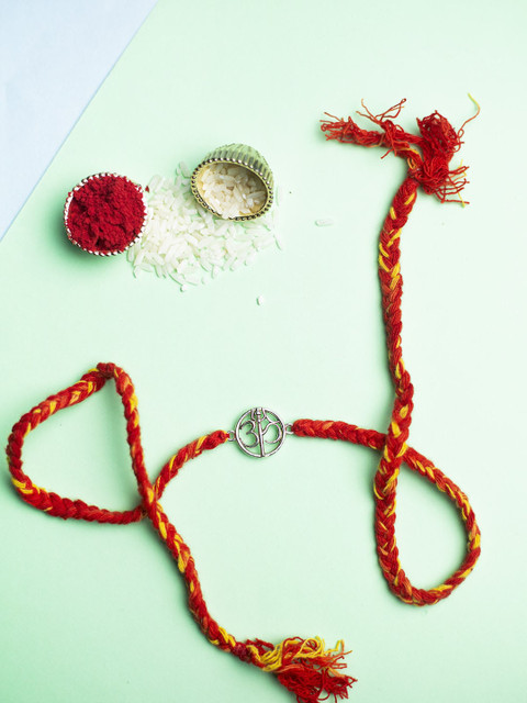 

CURIO COTTAGE Women Red & Silver-Toned Pure Silver The Elevated State of Mind "OM" Rakhi