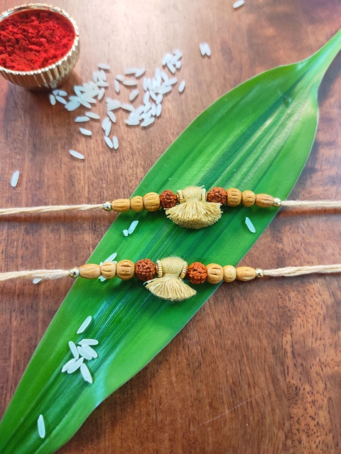 

CRAYTON Men Cream Coloured Rudraksh Beaded Thread Rakhi Set Of 2
