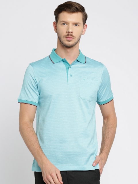 

Raymond Men Blue Self Design Polo Collar T-shirt