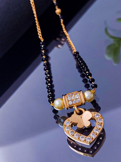 

Saizen Gold-Plated AD Studded Heart Shaped Pendant With Black Beaded Chain Mangalsutra