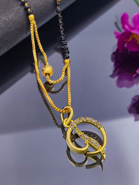 

Saizen Women Gold-Plated AD Studded Pendant & Black Beaded Chain Mangalsutra