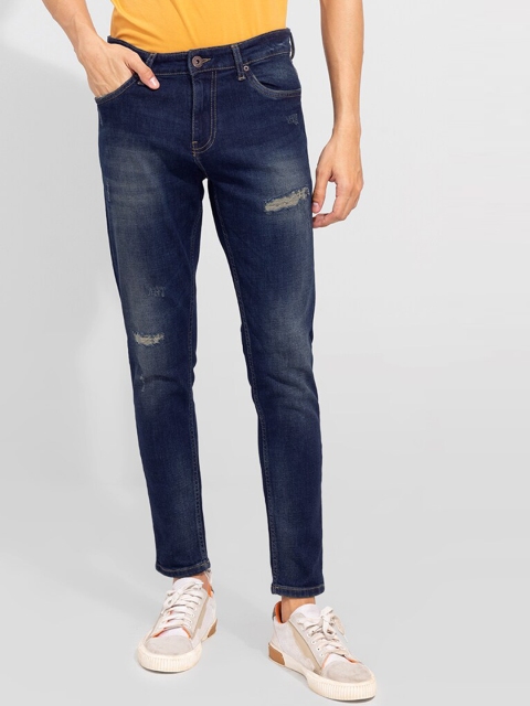 

Snitch Men Blue Skinny Fit Mildly Distressed Light Fade Stretchable Jeans