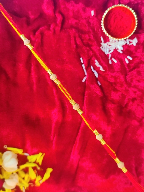 

CRAYTON Men Yellow & Red Sandalwood String Rakhi With RoliChawal