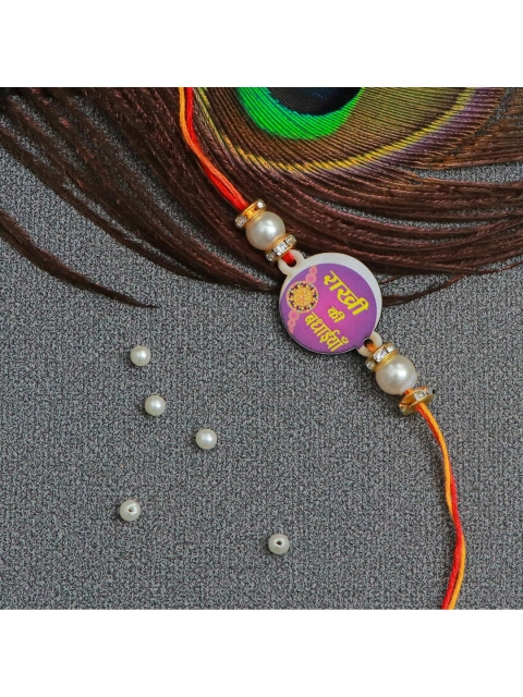 

The Magic Wand Purple & White Rakhi Ki Bhadahi Beaded Thread Rakhi