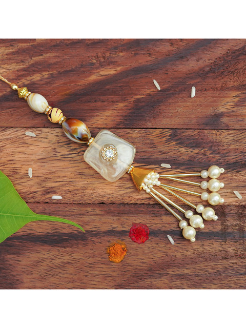 

The Magic Wand Kids-Boys Gold Coloured & White Beaded Lumba Rakhi