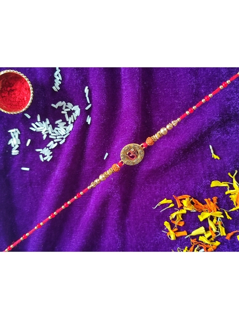 

CRAYTON Red Beaded Om Rakhi With Roli Chawal