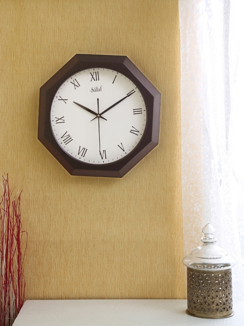 

Safal White Dial 30 cm x 30 cm Analogue Octagonal Wall Clock