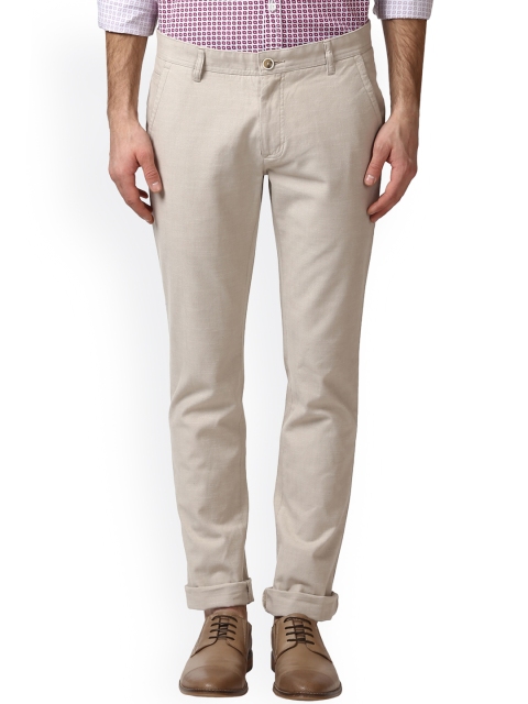 

ColorPlus Men Cream Regular Fit Solid Trousers