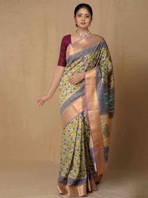

Unnati Silks Brown & Green Ethnic Motifs Zari Silk Blend Tussar Saree