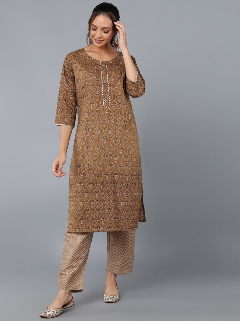 

Pikasha Women Brown Ethnic Motifs Printed Panelled Kurti with Trousers