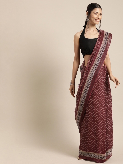 

Mitera Maroon & Beige Striped Patola Saree