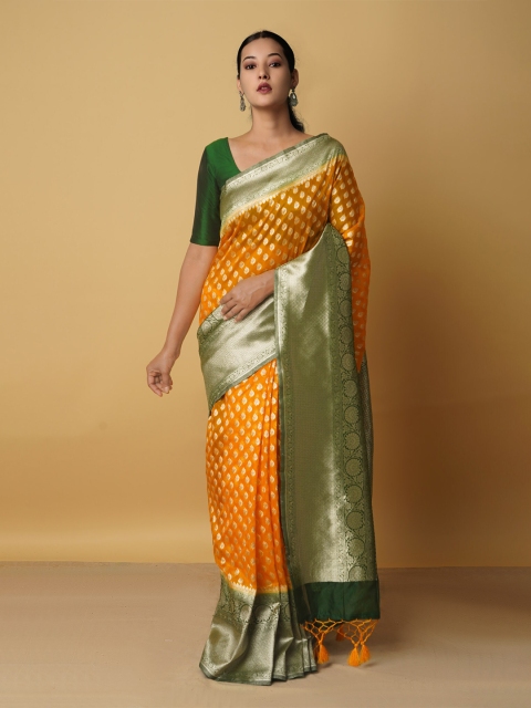 

Unnati Silks Orange & Green Woven Design Zari Silk Cotton Kanjeevaram Saree