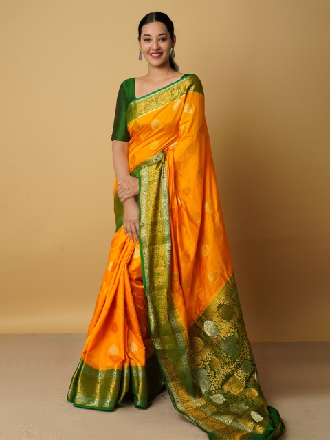 

Unnati Silks Orange & Green Woven Design Zari Silk Blend Kanjeevaram Saree