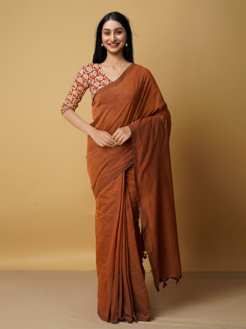 

Unnati Silks Rust Brown Pure Linen Jamdani Saree