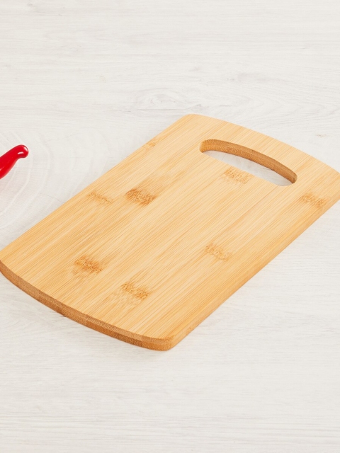 

Home Centre Brown Solid Wooden Chopping Board