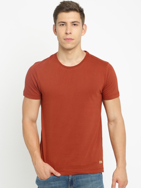 Arrow Blue Jean Co. Men Orange Solid Round Neck T-shirt available at myntra for Rs.399