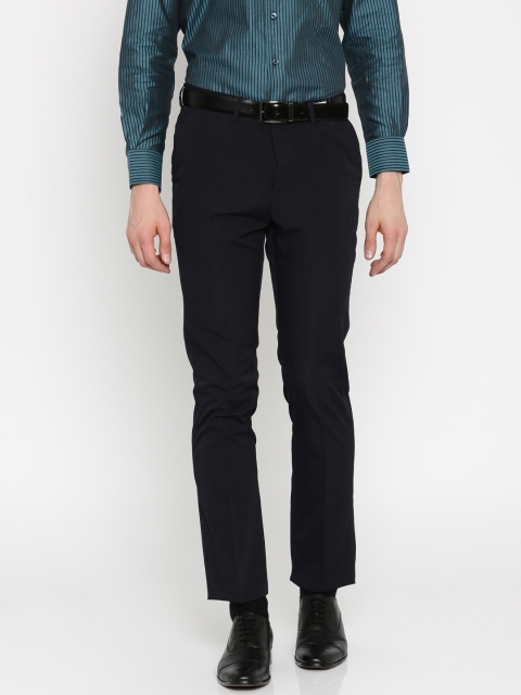 

Arrow New York Men Navy Tapered Fit Solid Trousers, Navy blue