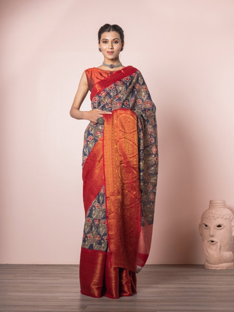 

Exclusiva Blue & Red Printed Floral Zari Linen Blend With Jacquard Border Saree