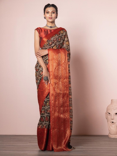 

Exclusiva Brown & Red Ethnic Motifs Zari Linen Blend Saree
