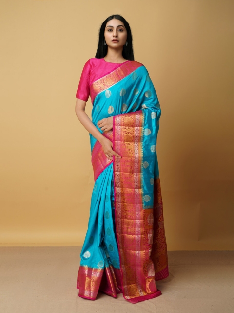 

Unnati Silks Women Blue & Red Ethnic Motifs Zari Silk Blend Saree