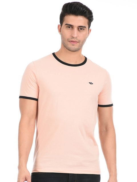

Cloak & Decker by Monte Carlo Men Peach Solid T-shirt