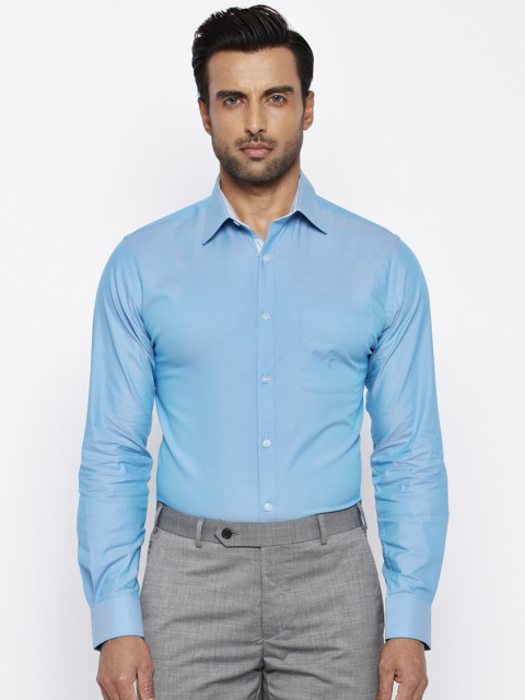 

Raymond Men Blue Regular Fit Solid Formal Shirt