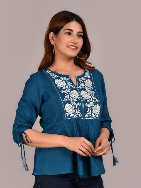 

Meeranshi Teal & White Floral Print Liva Empire Top