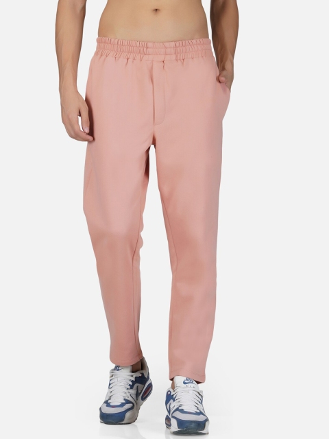 

Tinted Men Peach Coloured Solid Cotton Track Pants