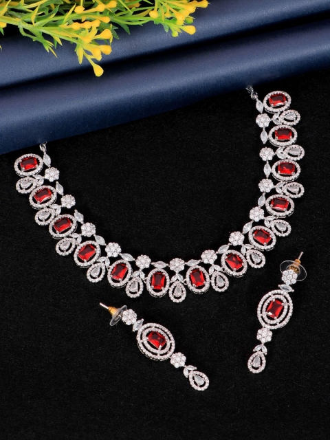 

SwaDev Women Silver-Plated & Red American Diamond Studded Jewellery Set