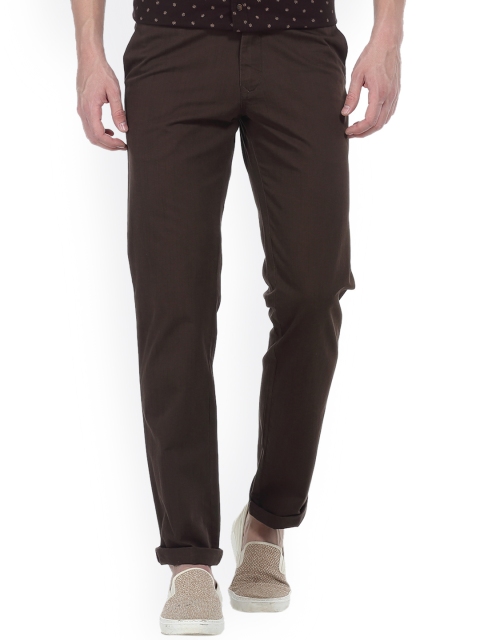 

Basics Men Brown Slim Fit Self Design Regular Trousers