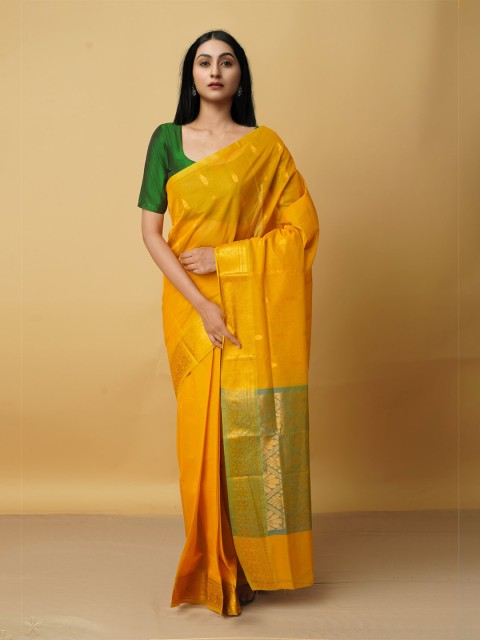 

Unnati Silks Orange & Green Woven Design Zari Pure Cotton Gadwal Saree