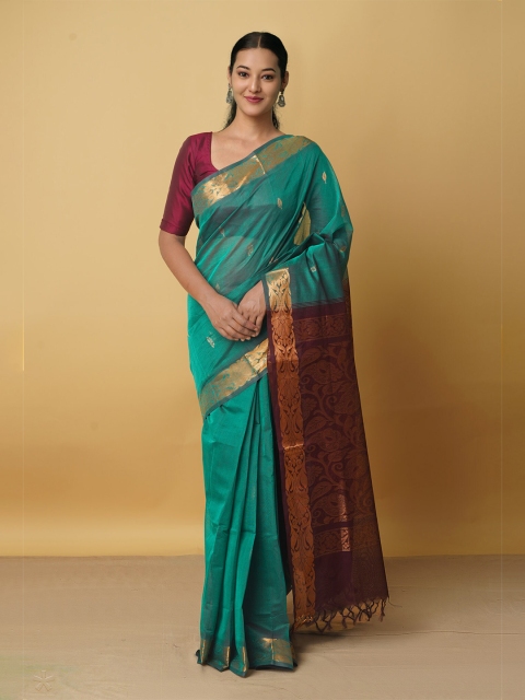 

Unnati Silks Green & Brown Woven Design Zari Pure Cotton Gadwal Saree