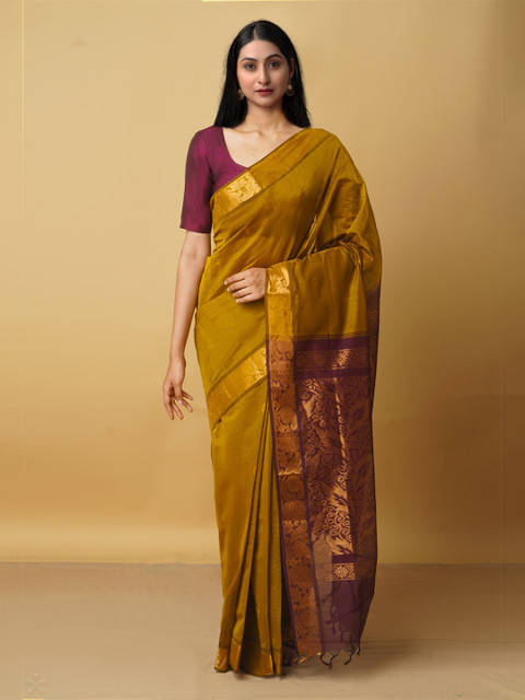 

Unnati Silks Green And Magenta Woven Design Zari Pure Cotton Gadwal Saree