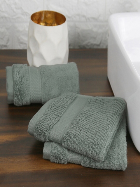 

Trident Pack Of 4 Green Solid 570 GSM Face Towels