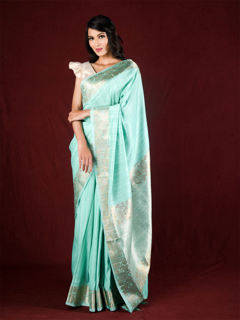 

Exclusiva Blue Floral Zari Silk Blend Saree