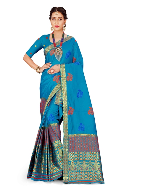 

Skirans Turquoise Blue & Red Ethnic Motifs Zari Saree
