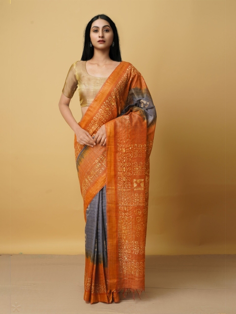 

Unnati Silks Grey & Orange Batik Silk Cotton Bhagalpuri Handloom Saree