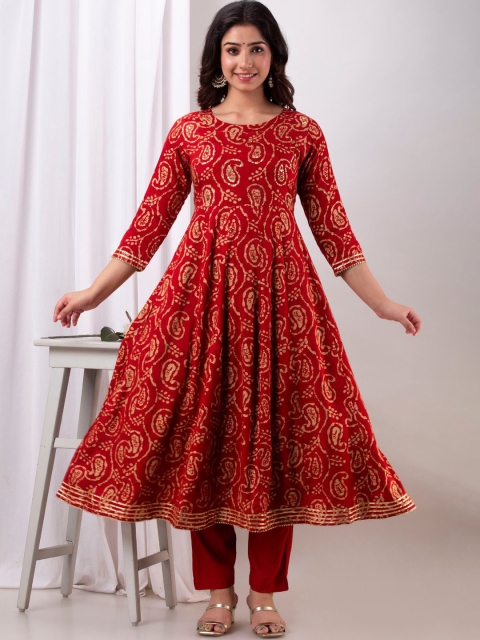 

Kesarya Women Rust Paisley Printed Sequinned Kurta with Trousers & With Dupatta