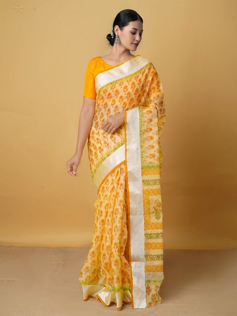 

Unnati Silks Yellow & Silver-Toned Ethnic Motifs Zari Pure Cotton Handloom Kota Saree