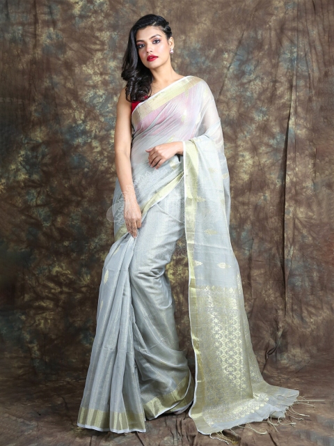 

Arhi Off White & Gold-Toned Ethnic Motifs Zari Tissue Saree