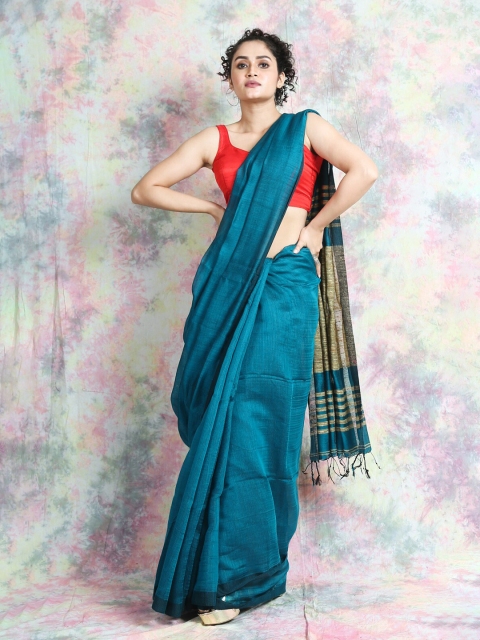 

Arhi Teal & Gold-Toned Woven Design Saree