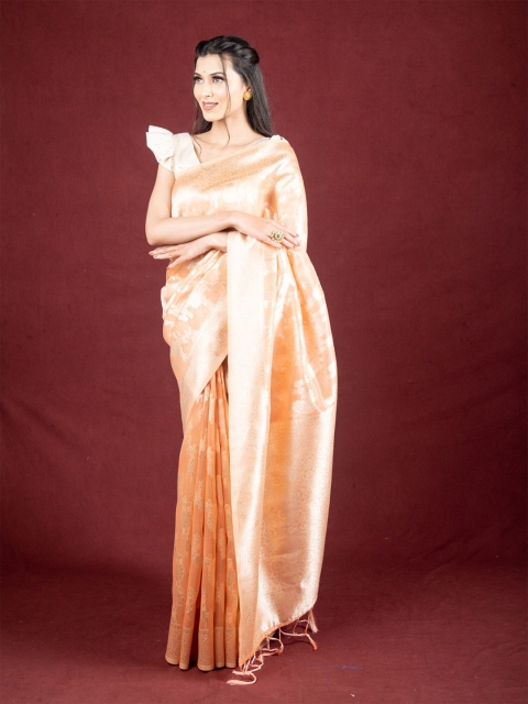 

Exclusiva Peach-Coloured Floral Woven Design Zari Saree